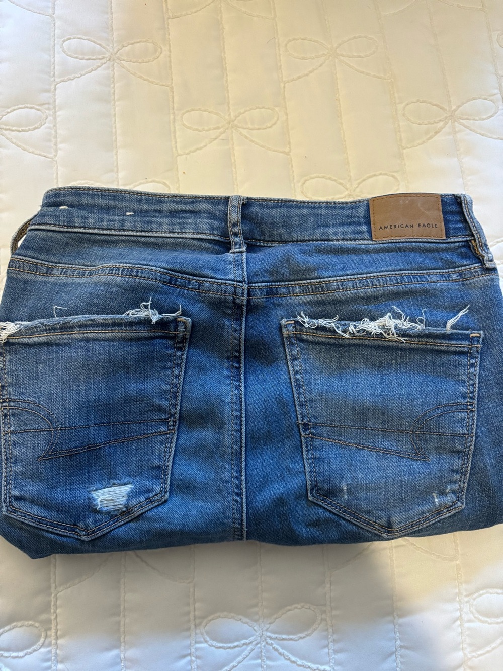American Eagle Outfitters Mid-Blue Distressed bootcut flair Jeans